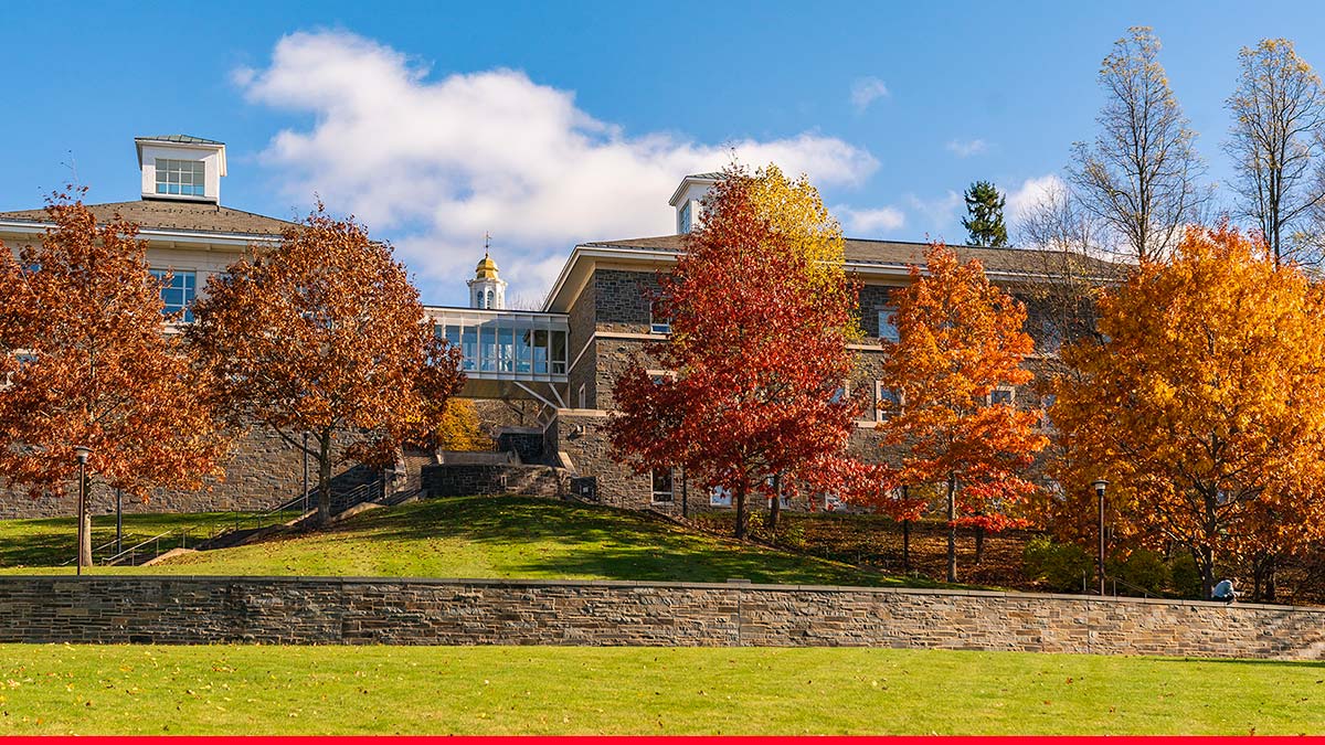 Scenic autumn view of Colgate Memorial Chapel over Persson Hall